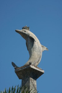 A stone statue of a dolphin in Bali.