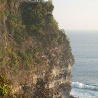 In Bali cliffs emerge high above the sea.