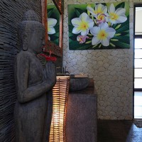 Buddha statue in the bathroom of the holiday villa in Bali.