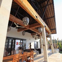 The fans provide cooling on the terrace of the villa in Bali.