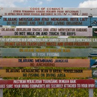 Beautiful picture with the rules that apply in Bali on colored planks.