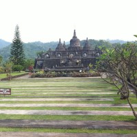 Visit the temples in Bali.