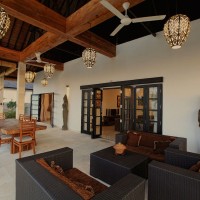 The holiday villa in Bali has a covered terrace overlooking the Bali sea.