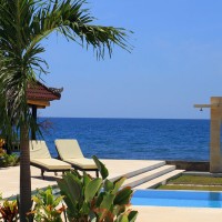 There is a sea view at the pool of our holiday villa in Bali.