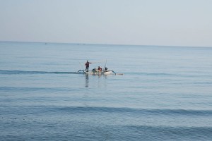 The locals fishing on the Bali sea.