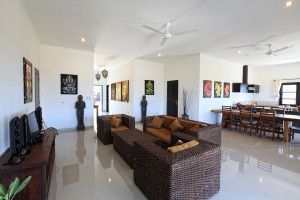 The villa has a spacious living and dining area.