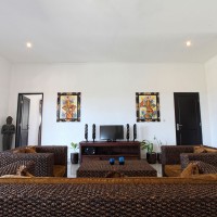 The living space of the house in Bali is cozy.